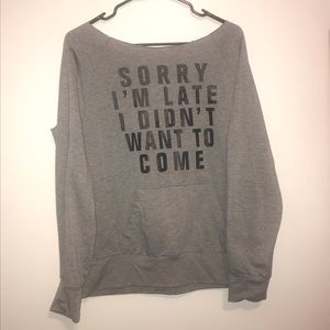 Light grey long sleeve with words on the front
